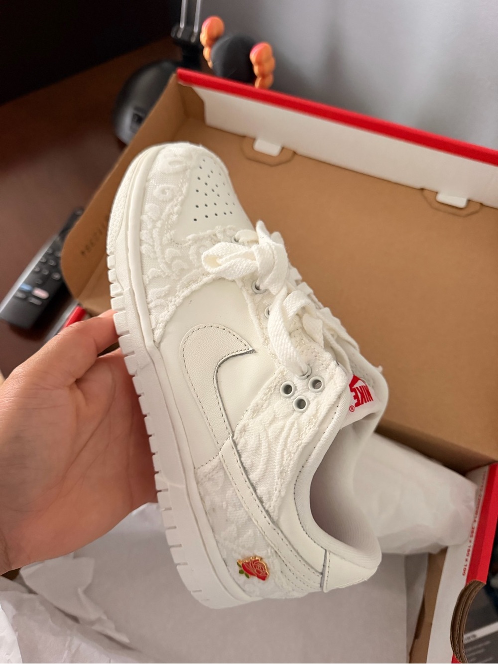 Nike Women’s White Embroidered Low-Top Sneakers with Red Rose Accent
